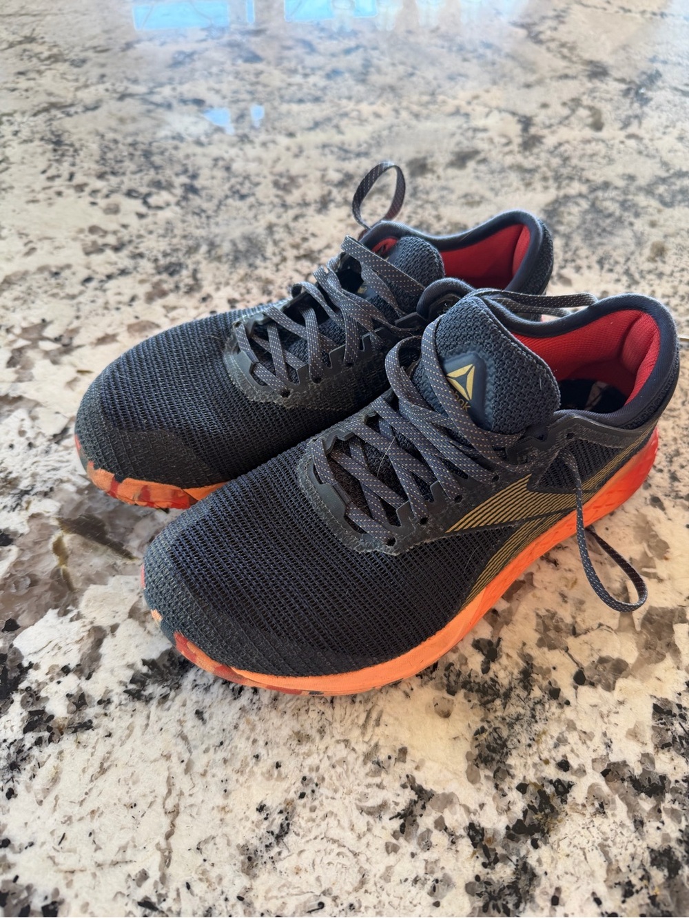 Reebok Men's Black Athletic Running Shoes with Orange Midsole